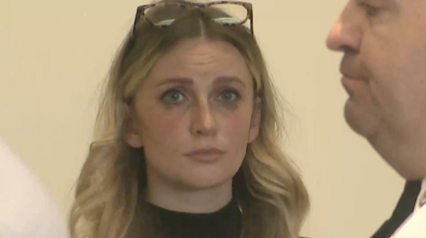 Police officer held without bond in custody battle assault case